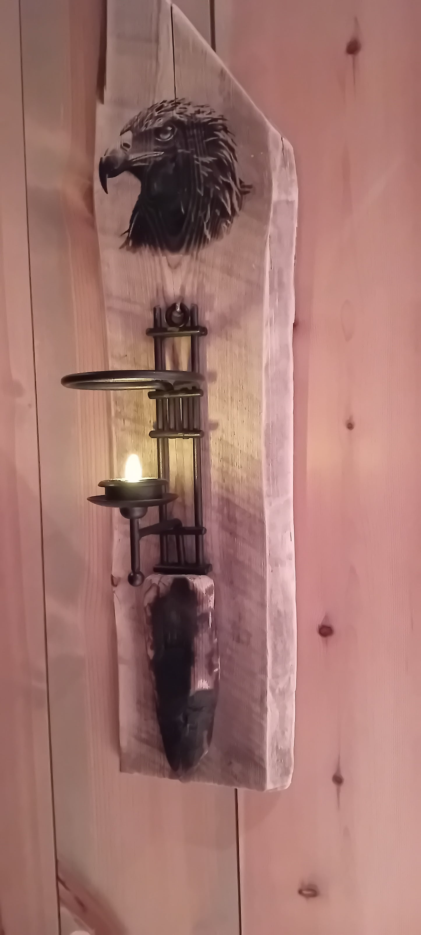 Wall light made of wilderness panel with eagle motif